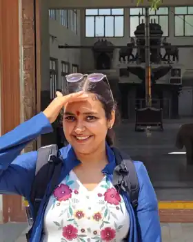 Minal Pandey smiling outdoors